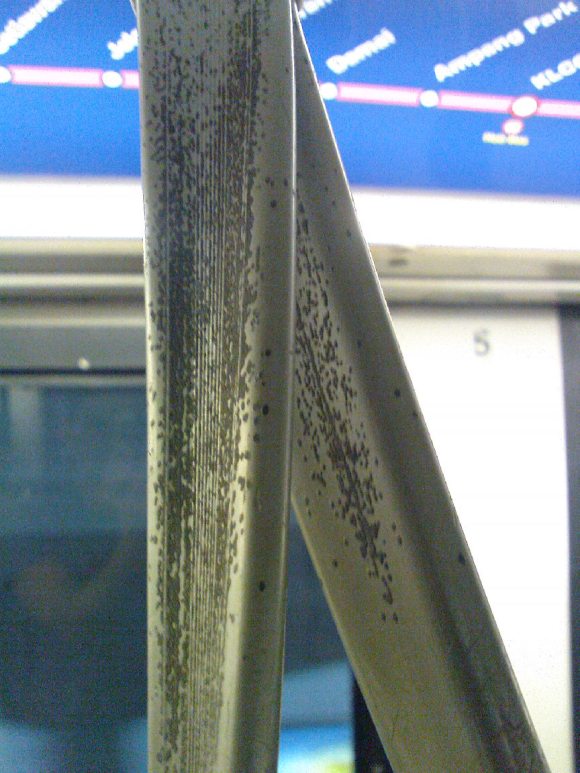 A handstrap from a RapidKL Kelana Jaya Line LRT train - does anyone know what the black stuff is? Whether it is safe or not?